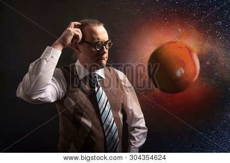 Funny Scientist Looking To Universe And Planet Mars