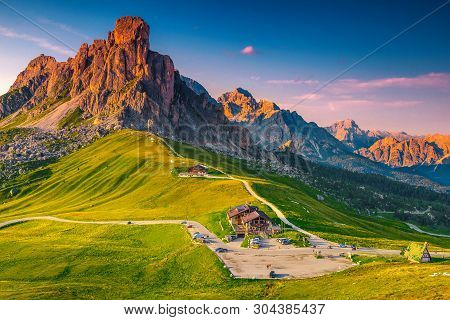 Majestic Sunset Landscape And Fantastic Travel Location. Alpine Pass And Winding Road, Passo Giau Wi