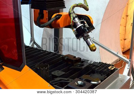 Cnc Laser Plasma Cutting Head, Close-up. Modern Technology In Process At Metalworking Manufacturing