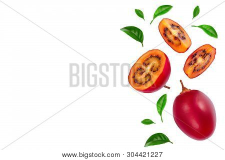 Fresh Tamarillo Fruit With Leaves Isolated On White Background With Copy Space For Your Text. Top Vi