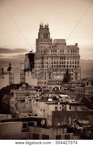 MADRID, SPAIN - MAY 13, 2018: Telefonica Building rise above historical buildings on Gran Via business district.