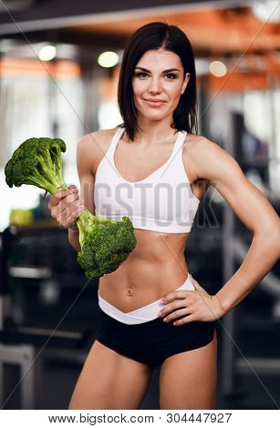 Diet And Fitness Concept. Self Confident Athletic Girl Fitnes Instructor With Perfect Body Encourage