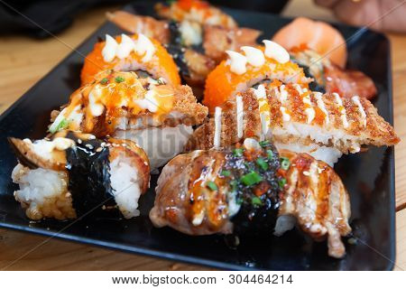 Fresh And Delicious Sushi Rolls On Plate. Close Up