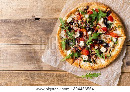 Vegetable Italian Pizza With Tomatos On Wodeen Background, Copy Space, Top View