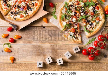 Vegetable Italian Pizza With Tomatos On Wodeen Background, Copy Space, Top View