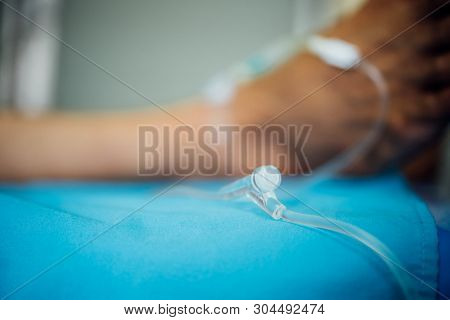 Patient With Saline Intravenous In The Hospital