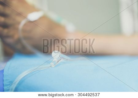 Patient With Saline Intravenous In The Hospital