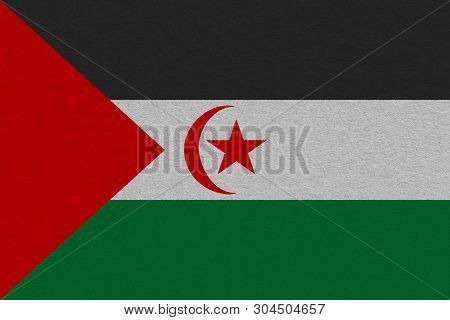 Sahrawi Arab Democratic Republic Flag Painted On Paper. Patriotic Background. National Flag Of Sahra