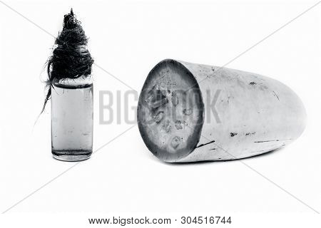Raw Organic Cut Half Bottle Gourd Isolated On White Along With Its Extracted Beneficial Oil In A Sma