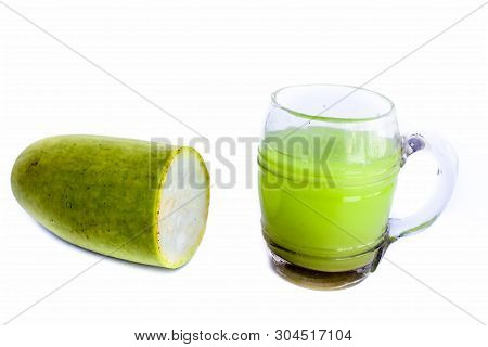 Raw Organic Lauki Or Bottle Gourd Isolated On White With Its Extracted Juice In A Glass Also.