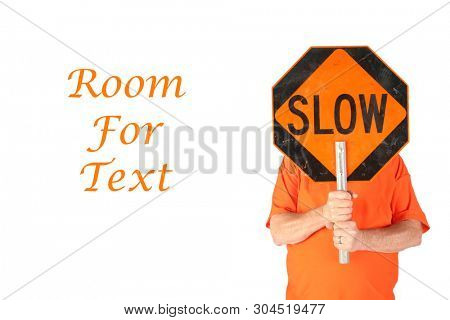 Man with SLOW hand held construction or traffic sign. Isolated on white. Room for text. 

