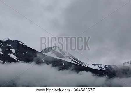Gloomy Mountain Landscape. Foggy Mountains Of Norway