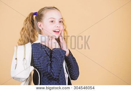 Popular Useful Fashion Accessory. Schoolgirl Ponytails Hairstyle With Small Backpack. Carrying Thing