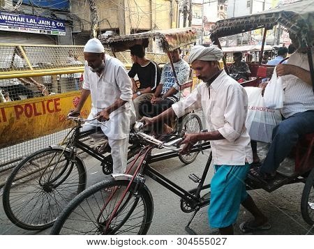 New Delhi , India - May 19,2019 : Unidentified Driver Tricycle Is Taking Passengers From Chawri Baza