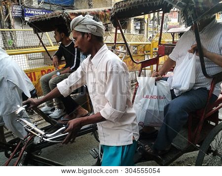 New Delhi , India - May 19,2019 : Unidentified Driver Tricycle Is Taking Passengers From Chawri Baza