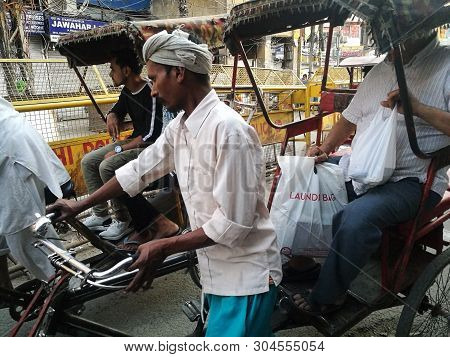 New Delhi , India - May 19,2019 : Unidentified Driver Tricycle Is Taking Passengers From Chawri Baza