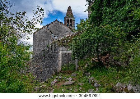 The Ruins Of An Old Abandoned Catholic Church Stara Zupna Crkva On Mount Vrmac, The Town Of Prcanj, 