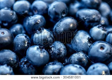 Heap Of Blueberries Or Huckleberries Background, Fresh And Organic Berries