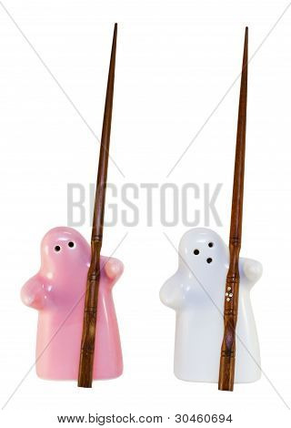 Pepper Shaker ja keittosuola horjuttaa puikoilla
