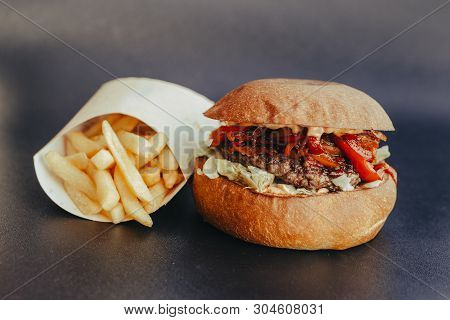 Burger Flyer. Cheese Burger With Grilled Meat, Cheese, Salad And Onion Rings. Close-up Of Delicious 