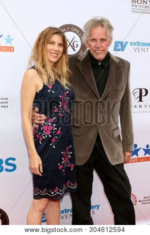 LOS ANGELES - JUN 1:  Steffanie Sampson, Gary Busey at the 7th Annual Ed Asner Poker Tournament at the CBS Studio Center on June 1, 2019 in Studio City, CA