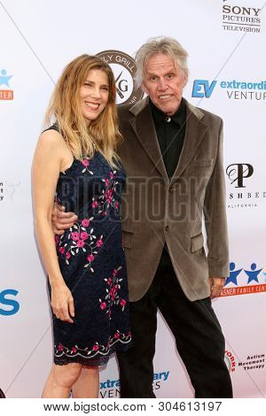 LOS ANGELES - JUN 1:  Steffanie Sampson, Gary Busey at the 7th Annual Ed Asner Poker Tournament at the CBS Studio Center on June 1, 2019 in Studio City, CA