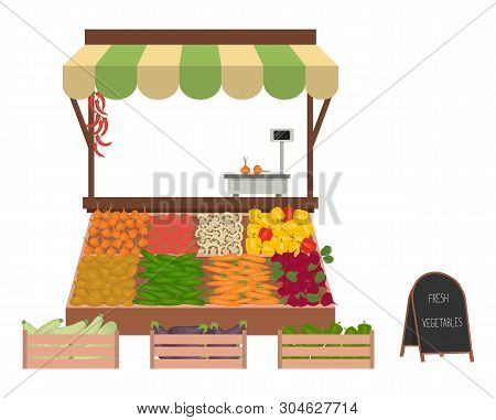 Tray With Vegetables On The Market. Workplace Of The Market Seller. There Is Scales And Goods: Cucum
