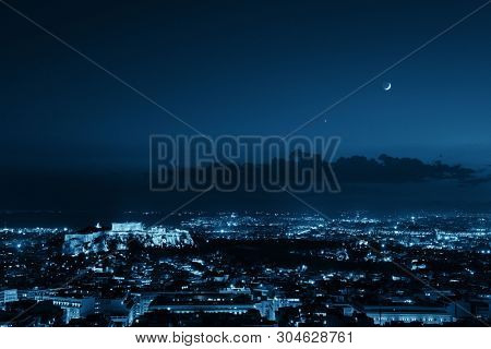Athens skyline at night viewed from Mt Lykavitos with Acropolis, Greece.