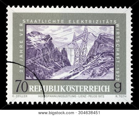 ZAGREB, CROATIA - JULY 02, 2014: A stamp issued in the Austria shows High Voltage Power Line Lienz-Pelos, the 25th Anniversary of Nationalized Electricity Industry, circa 1972.