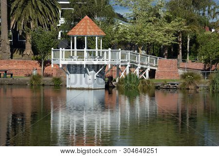 Gazebo At The Park Surround By Trees And Nature