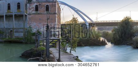 Cordoba, Spain - 2018 Dec 9th: Old Casillas Watermil Former Hydro-electric Power Plant, Guadalquivir
