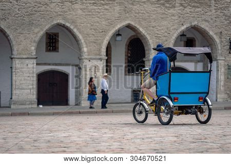 Tricycle Taxi For Tourists On City Center Street