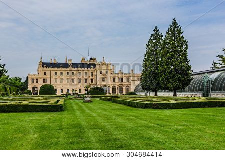 Lednice, Czech Republic - May 28 2019: Famous Lednice Castle In South Moravia With Yellow Facade. Ga