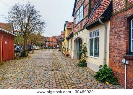Luneburg, Germany - November 04, 2018: Street With Medieval Old Brick Buildings In Luneburg