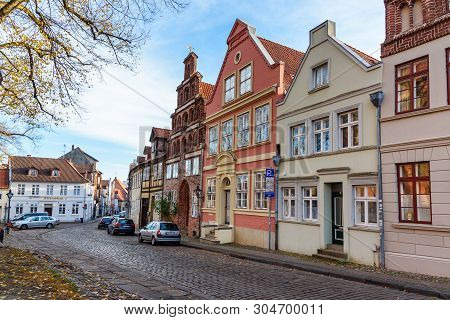 Luneburg, Germany - November 06, 2018: Street With Medieval Old Brick Buildings In Luneburg