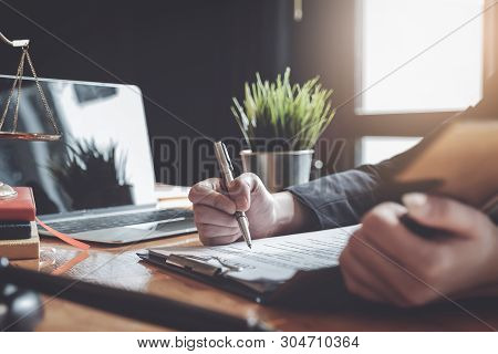 Law Concept, Lawyer Woman Hoding Pen With Contract Or Agreement Document To Customer For Signing In 