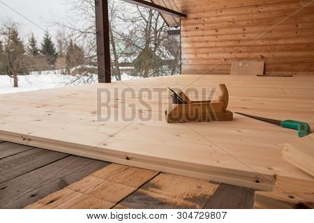 Jointer And Saw. Old Wooden Jointer Carpenter Tool And Metal Saw On Wooden Background