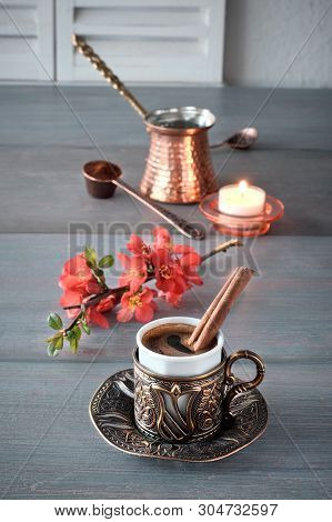 Oriental Coffee Cooked In Traditional Turkish Copper Coffee Pot And  Served In A Matching Cup In Orn