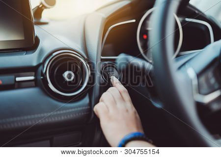 Push Start,stop Button Engine Car Control Of Finger Woman Before Driving After Press The Brake.