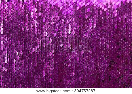 Sequins Close-up Macro. Abstract Background With Pink Sequins Color On The Fabric.texture Scales Of 