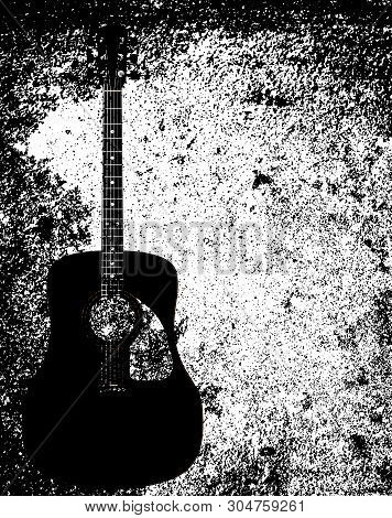 A Typical Acoustic Guitar Isolated Over A Grunge Background