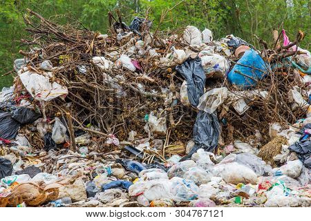 Garbage Dump Pile In Trash Dump Or Landfill,truck Is Dumping The Gabage From Municipal,pollution Con