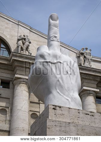 Milan, Italy - May 25, 2019: Middle Finger Sculpture And Mezzanotte Palace Facade In Milan Stock Exc