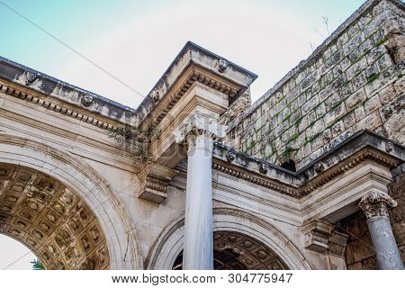 Adrian Gate, Antalya Landmark, Turkey. Antique Ancient Construction Of Marble And Limestone.