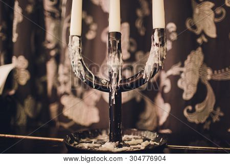 Triple Vintage Candlestick Made Of Glass And Black Metal, Two White Stearin Candles And One Candle E