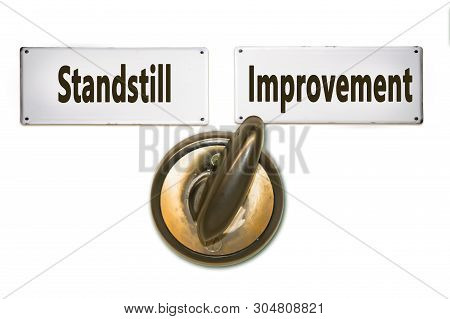 Street Sign The Direction Way To Improvement Versus Standstill