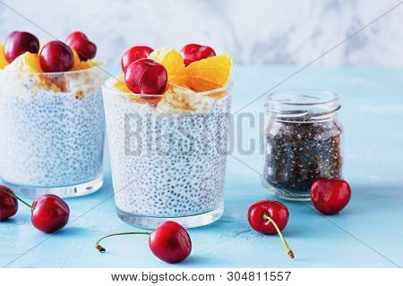 Natural Yogurt With Chia Seeds Early Breakfast. Vegetarian Cottage Cheese Decorated With Cutted Frui