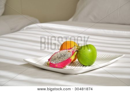 Fresh fruits on the bed