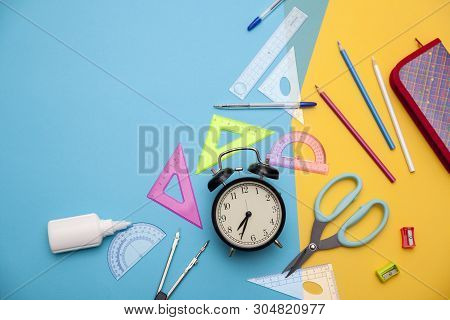 Starting School, Back To School, Education Are Styled Flat Lay Scene With School Supplies On Blue An
