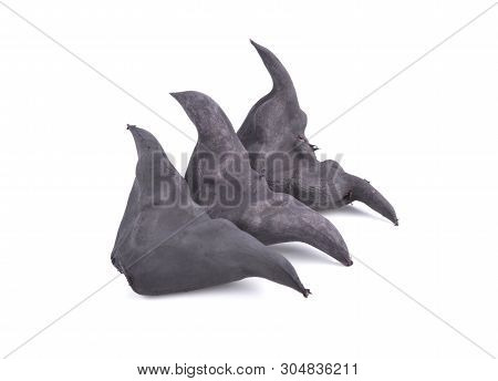 Boiled Bull Horn Shaped Water Caltrop Nut On White Background